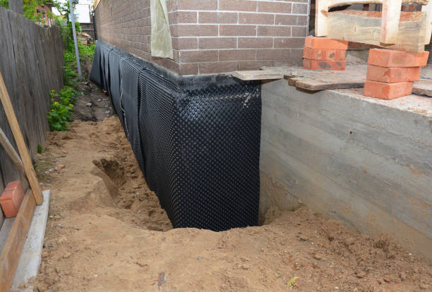 Happy homeowners after waterproofing job in Gatlinburg